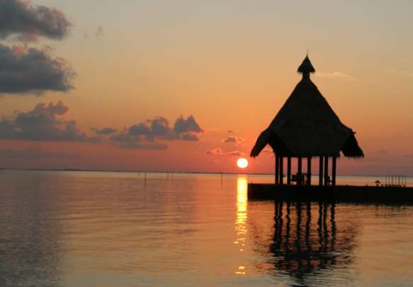 Get enthralled by the stunning sunset at Maldives Canareef Resort