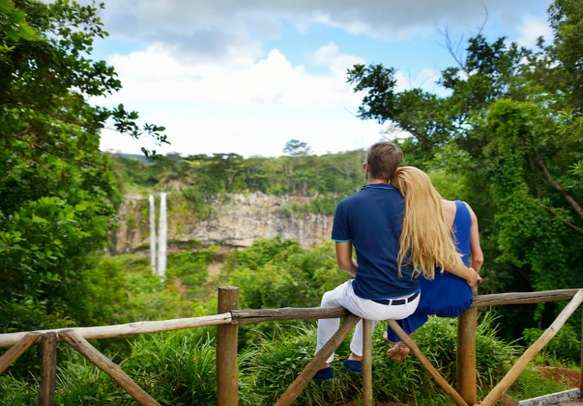 A couple enjoying at the Chamarel waterfall