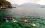 Travelers enjoying snorkelling in Andaman