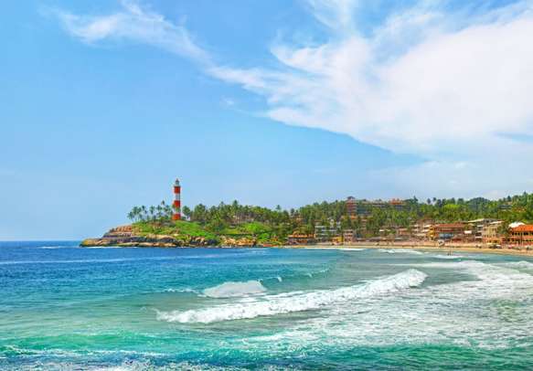 Laze around on the Kovalam beach on this Kerala holiday.
