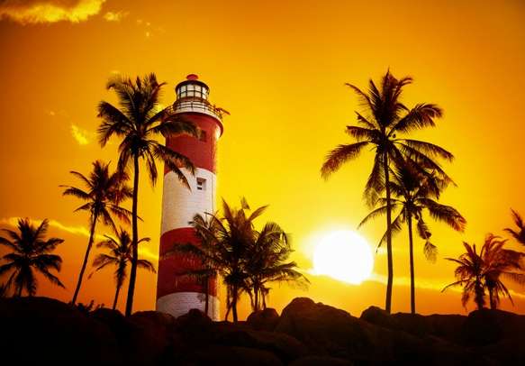 Stroll around the Lighthouse beach on this Kerala holiday tour.	