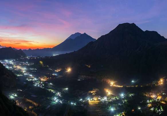 Sunrise over the caldera of Batur volcano in Bali