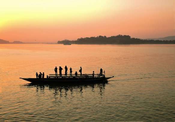 Guwahati, People enjoying sunset at the beach of River Brahmaputra