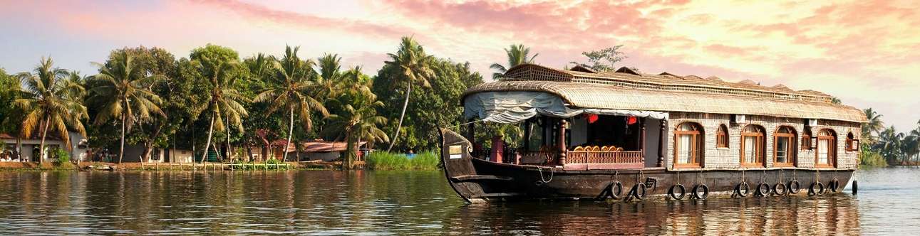 A beautiful houseboat in the backwaters of Kerala