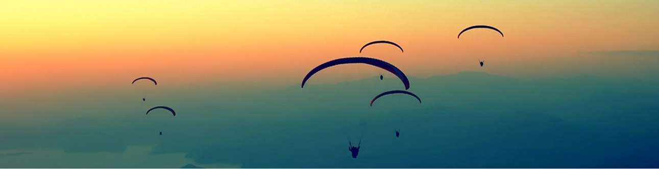 Enjoy the bird's-eye view while paragliding in Munnar