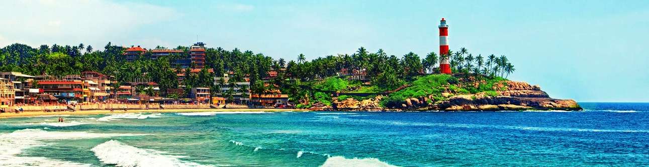 Walk along the smooth sand beaches in Kovalam