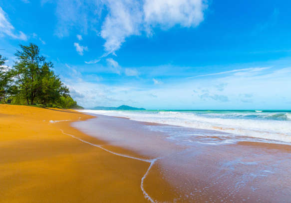 View of a beautiful beach in Phuket on a bright sunny day
