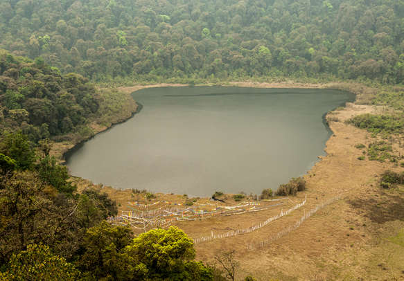 Calming Khechopalri lake to relax on bank