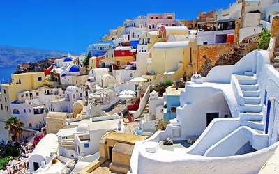 These colorful houses of Santorini have drawn many movie directors and producers to its magical land