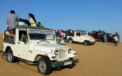 Visitors enjoying jeep safari in Jaisalmer