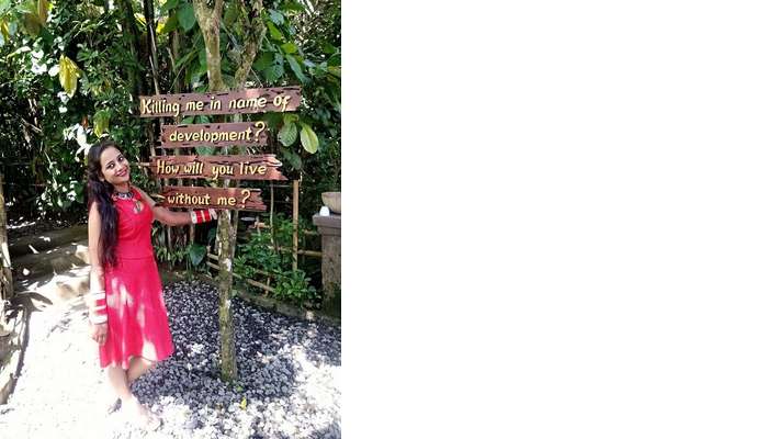 pankaj honeymoon trip to bali: posing near clean bali sign