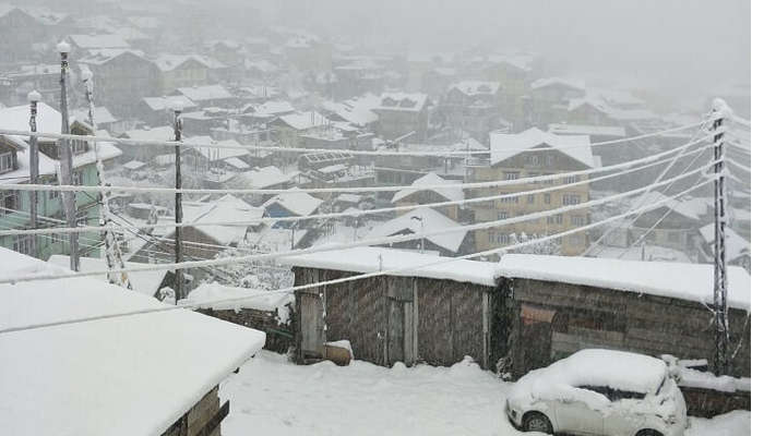 beautiful view of snow covered houses