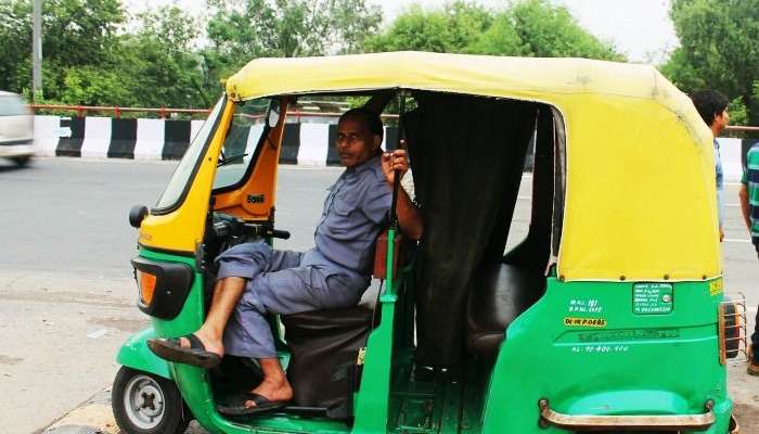 An autowala waiting for his safari