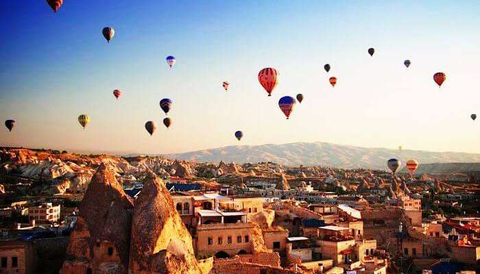 Sky full of hot air balloons in Cappadocia, one of best places to visit in Turkey