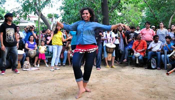 People rejoicing at Delhi Drum Circle, one of the most fun places to visit in Delhi