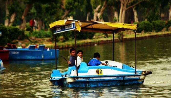 Paddle boating in lake near one of the best picnic spots in Delhi - India Gate