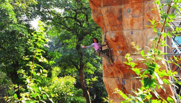 A girl on the sport climbing wall in Indian Mountaineering Foundation in Delhi