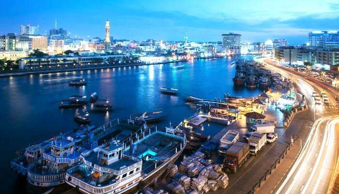 Take an abra ride through the Dubai creek at night to witness the grandeur of the city