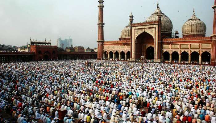 Devotees bow to their God on Eid at the largest mosque in India. 