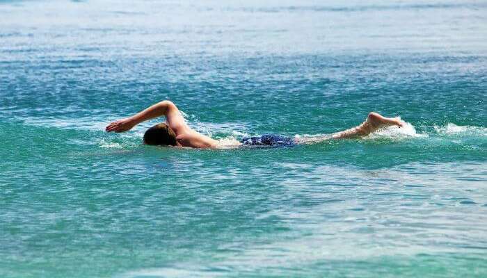 An enthusiastic swimmer enjoying swimming at La Cambuse