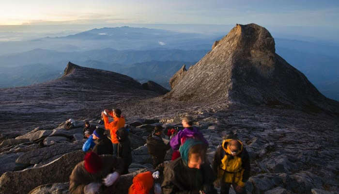 Several hikers at Mount Kinabalu is among the best places to visit in Malaysia for hiking 