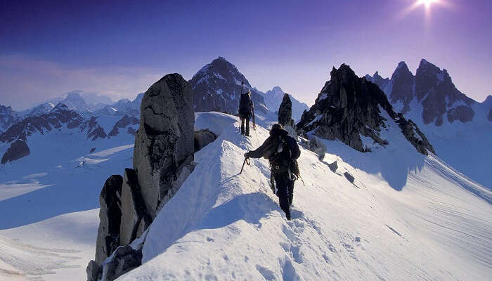 Mountaineers in Manali making their way through dense snow