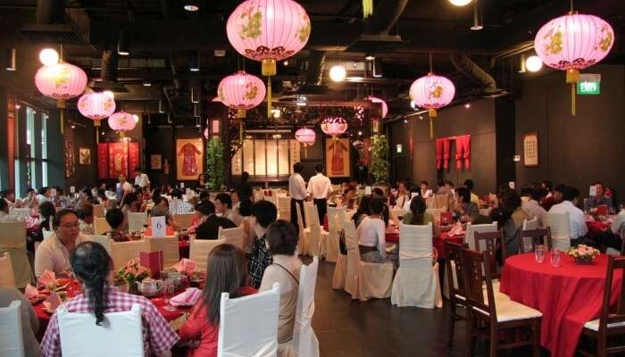 tourists and locals dine at the famous Chef Chan restaurant