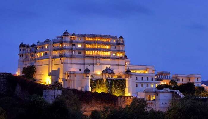 Brightly-lit Raas Devigarh hotel from outside