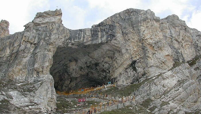 The holy cave temple of Lord Shiva at Amarnath that is one of the best places to visit in India in July