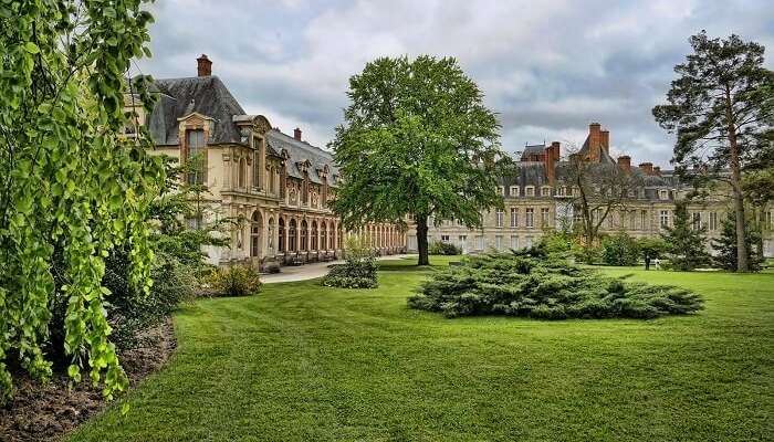 Royal gardens of Palace of Fontainebleau in France