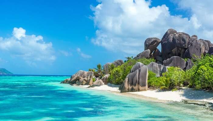 Granite rocks at beautiful beach on tropical island La Digue in Seychelles