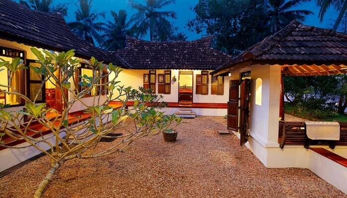 Well-lit villas of Philipkutty Farm in Kumarakom region in Kerala