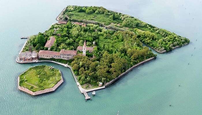 Bird eye view of the abandoned Poveglia Island in Italy