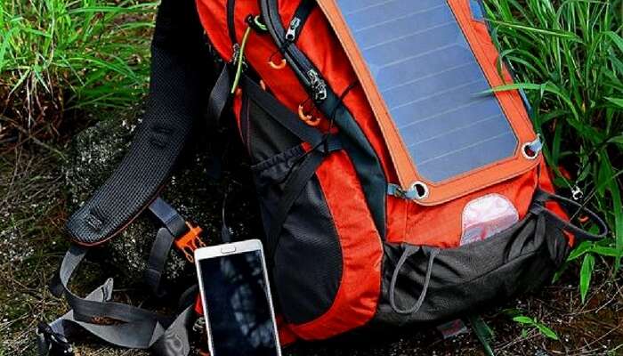 Gopax solar backpack charging a smartphone