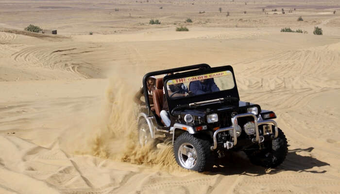 Tourists taking a jeep safari in Jaisalmer