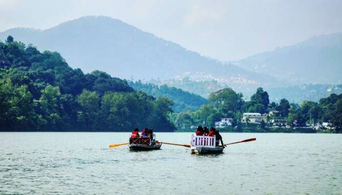 engaging in boating at bhimtal