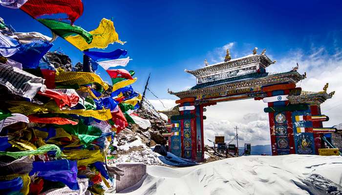prayer flags near Tawang gate which is covered by snow