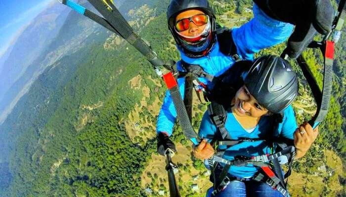 Radhika indulging in paragliding over Bir