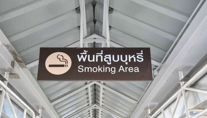 Board with no smoking sign in Thailand