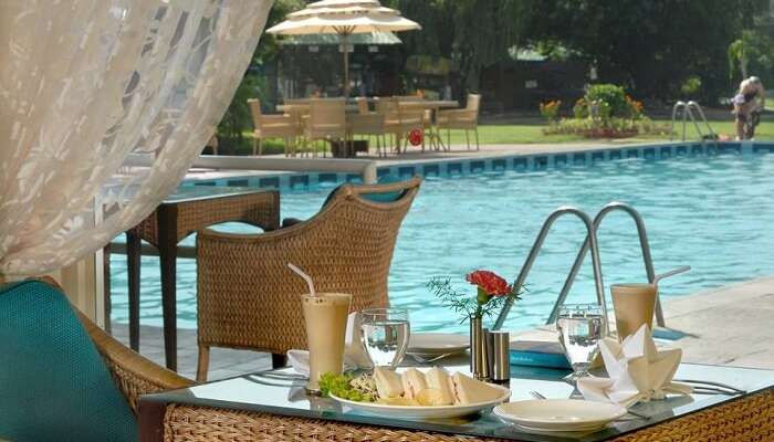 A shot of the poolside coffee lounge at the Country Club Resort near Gurgaon