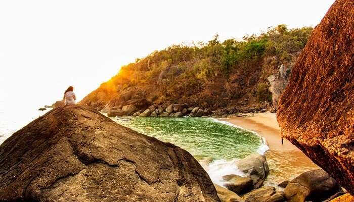 A splendid shot of a beautiful sunset at the Butterfly beach in Goa