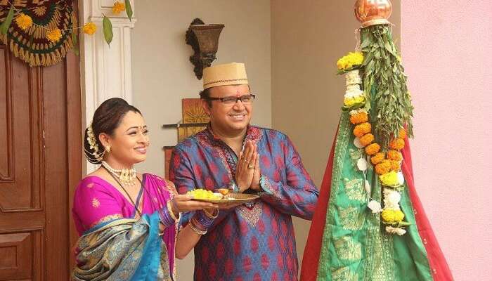 a couple worshipping during Gudi Padwa