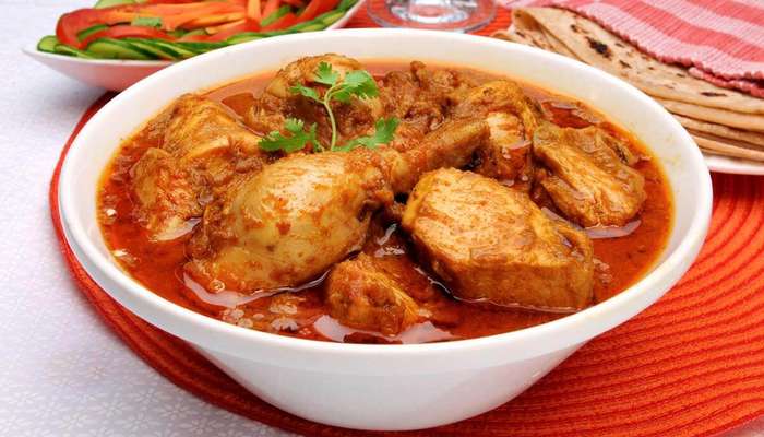 chicken curry in a big white bowl