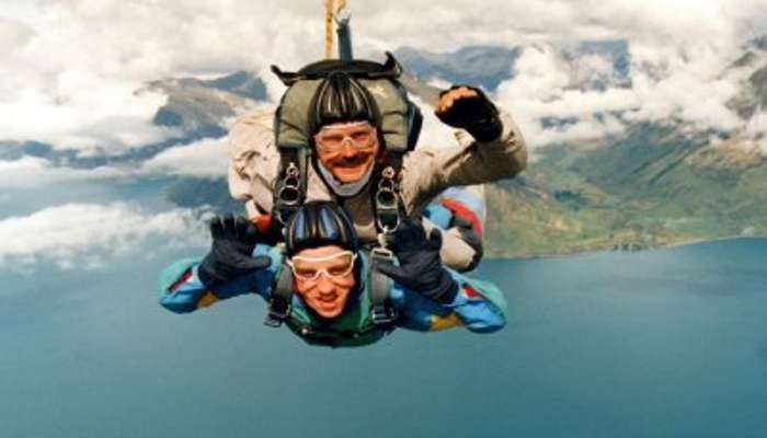 Two men diving in the sky
