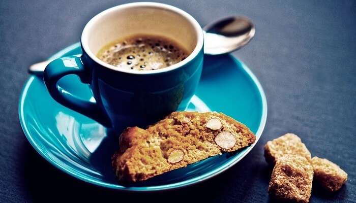 a cup of coffee with toast