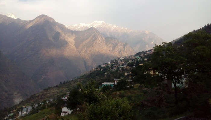 view of the valley with various mountains in the backdrop