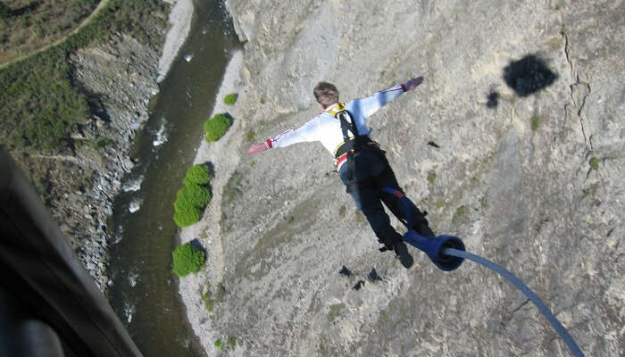 guy jumping from nevi highwire