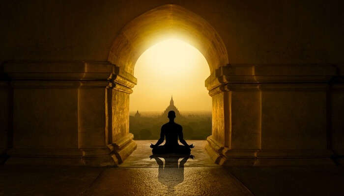 Man practicing yoga in Bali