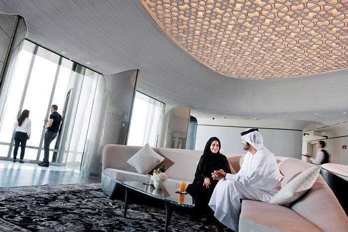 Guests relax and interact at the At The Top Sky Lounge on level 148 of Burj Khalifa