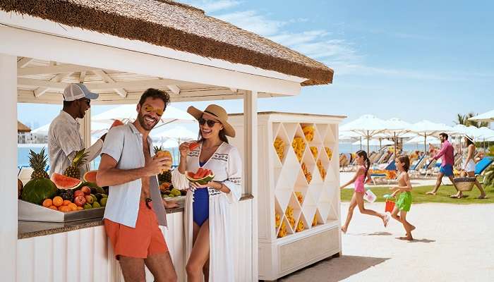 Palm Beach Couple Eating Fruit